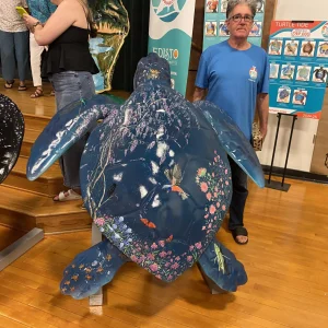 Aurora, the turtle, with artist